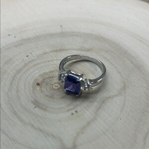 Elegant Silver Ring with Purple Gemstone